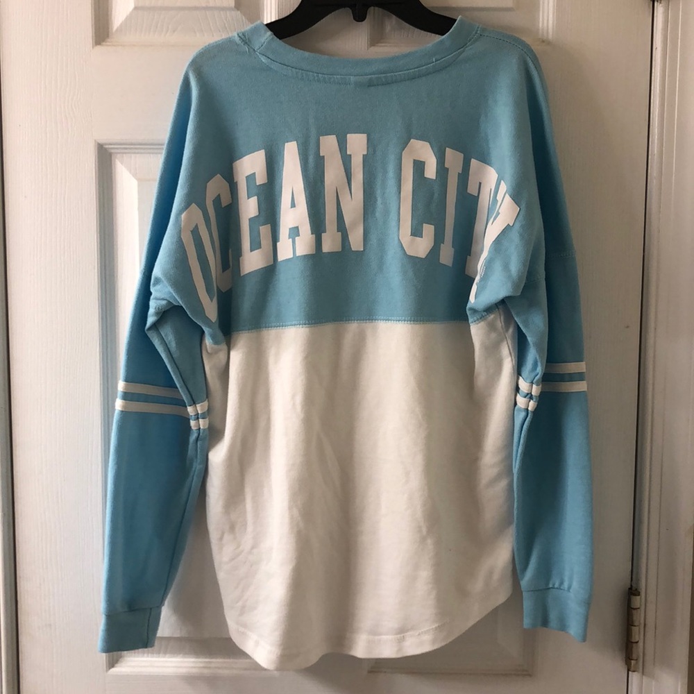 blue and white ocean city tee shirt
